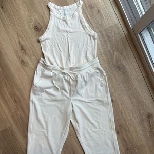 White top and white joggers